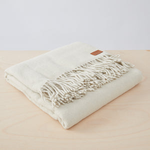 Lama blanket in nature with fringes.