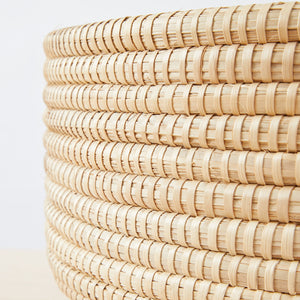 Detail view Dengu basket in rattan.