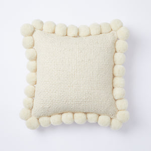 A great eye-catcher on your sofa or in your favourite armchair. Individual, lovingly handmade BY NATIVE Pom Pom cushion made from 100% Argentinian virgin wool.