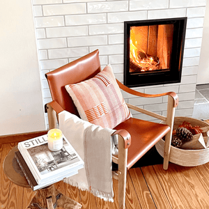 Safari armchair by the fireplace- By Native