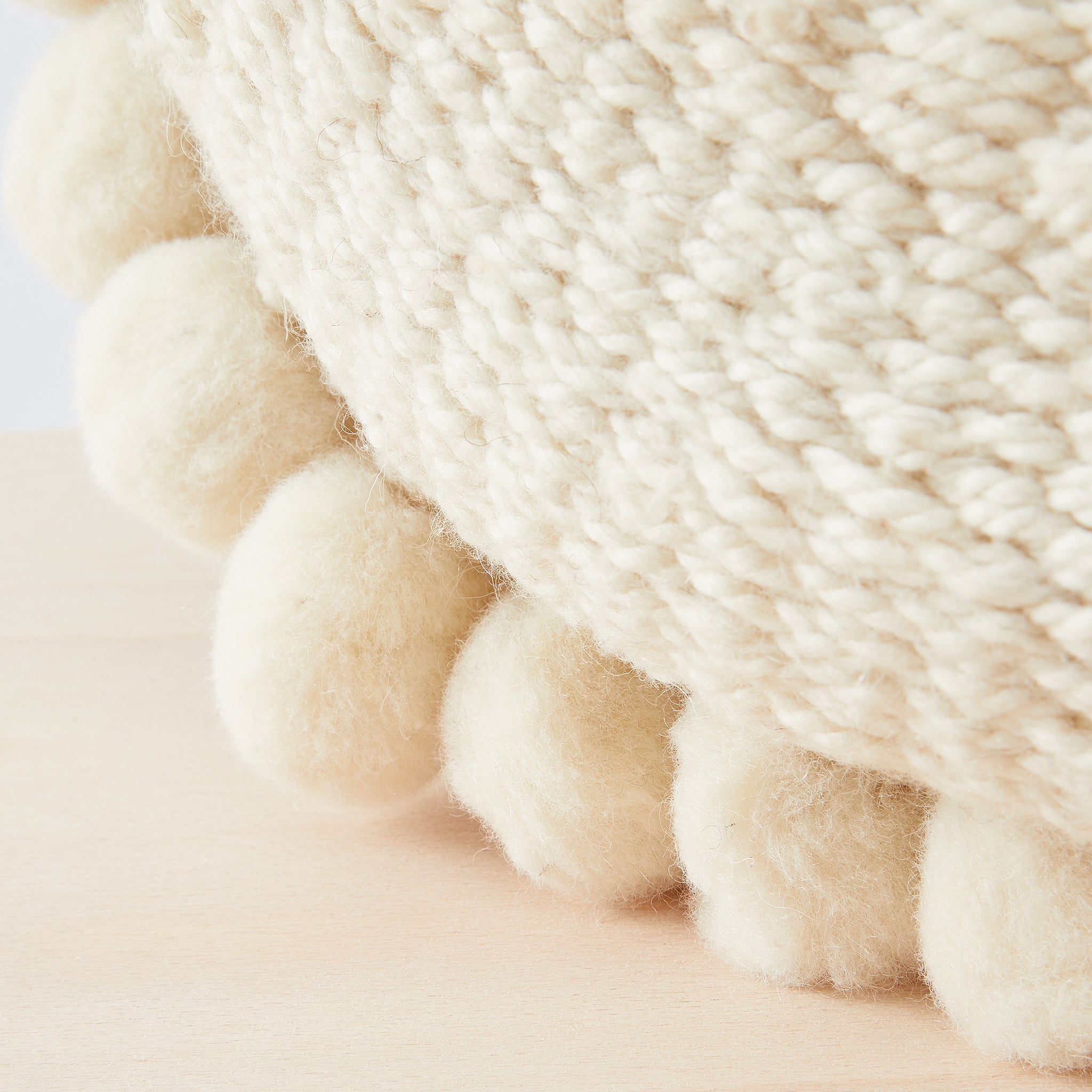 Pom Pom Cushion Detail. 