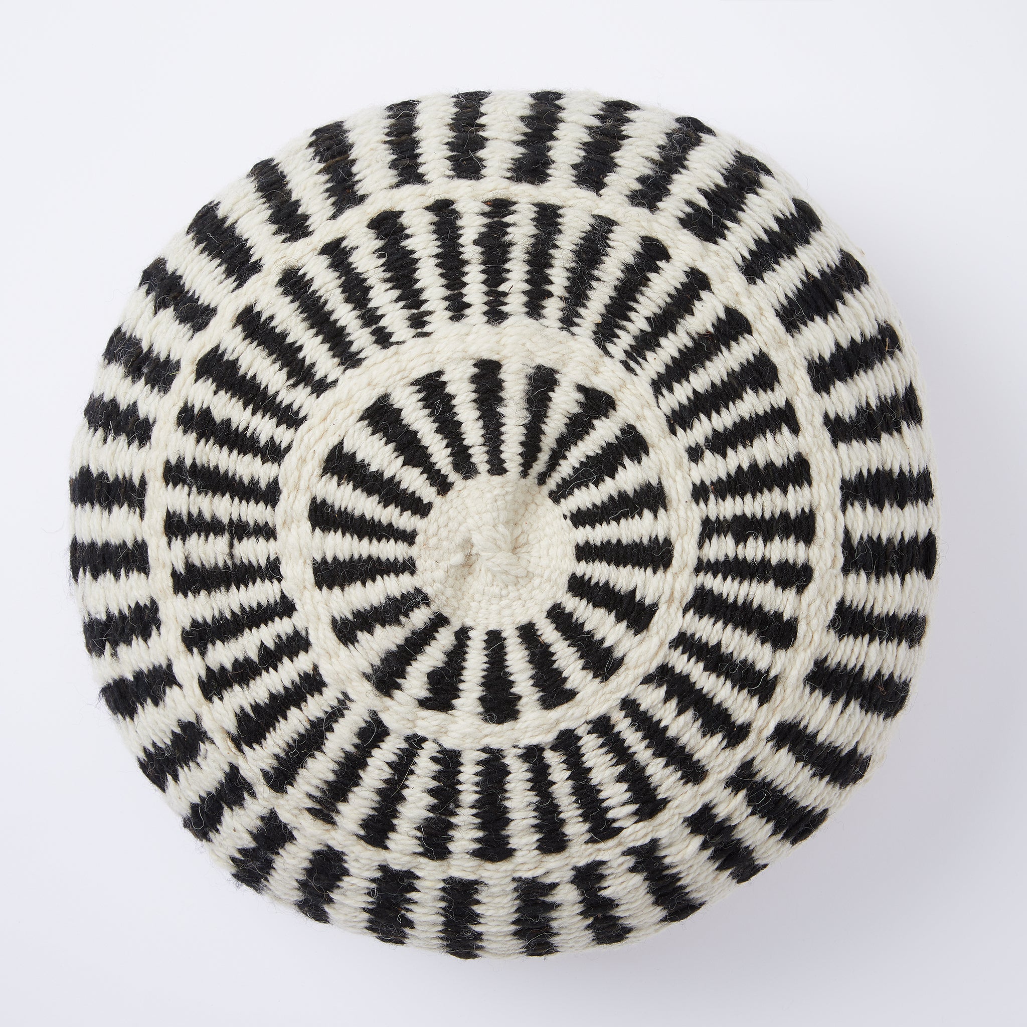 A great eye-catcher on your sofa or in your favourite armchair. Individual, lovingly handmade cushion made of 100% Argentinian sheep's wool with a traditional pattern in natural white and black.