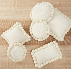 Hand-woven PomPom wool cushions from Argentina